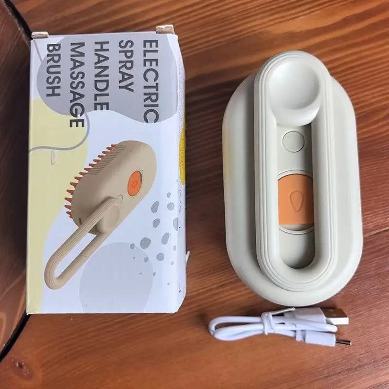 Electric steam grooming brush with white handle, orange control button, and cord connection
