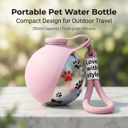 Pink portable pet water bottle with paw-print design and carry strap, 285 mL